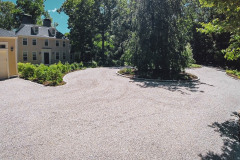 Wide angle picture of chipsealed driveway